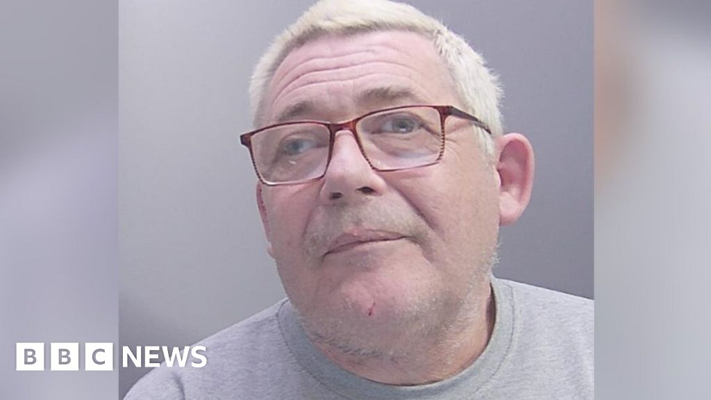 Police custody photo of Darren Moore
