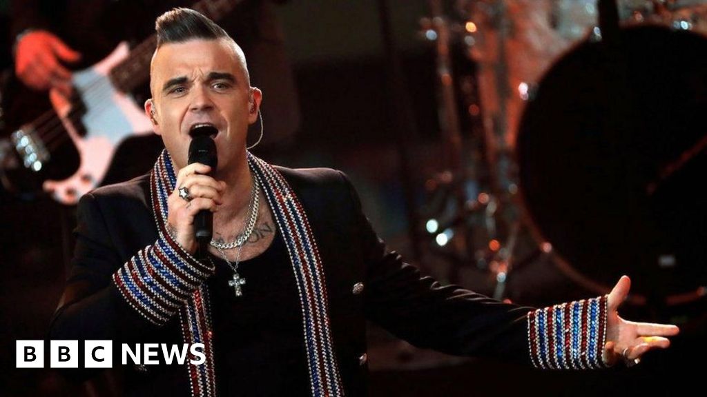 Robbie Williams hits back at comments made by ex-Take That manager Nigel Martin-Smith in Boybands Forever