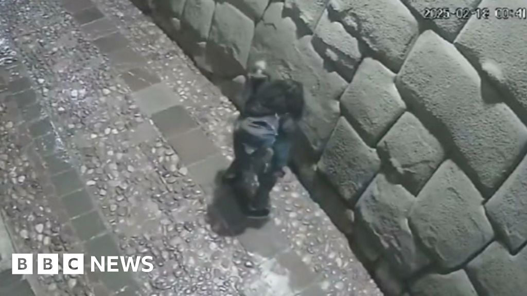 Moment man vandalises ancient Incan artefact in Peru