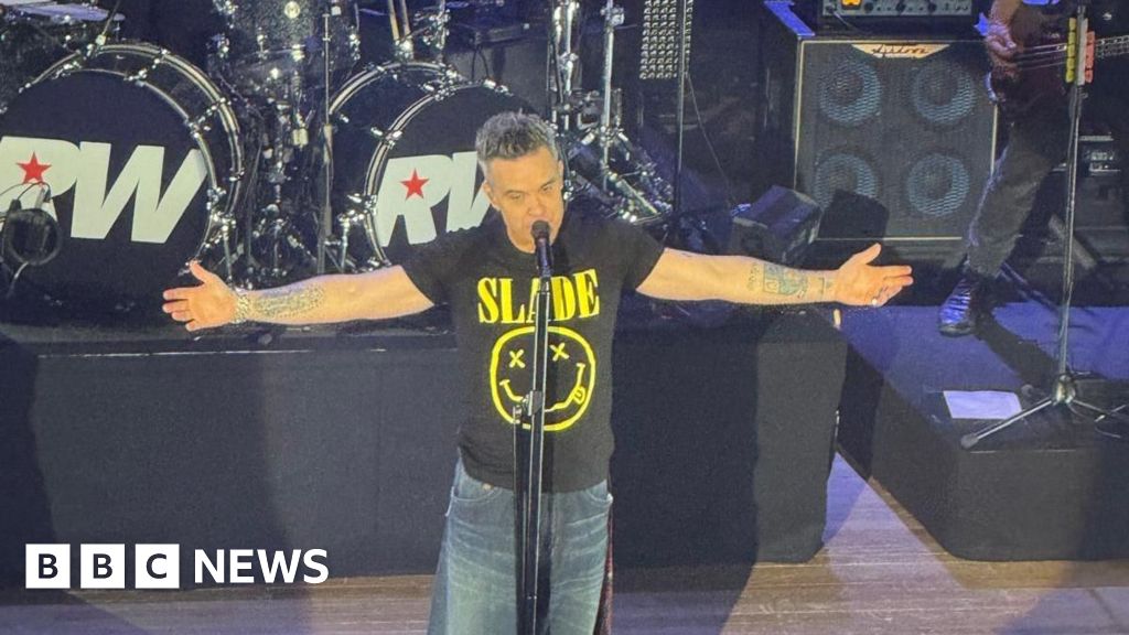Wolverhampton superfan joins Robbie Williams on stage