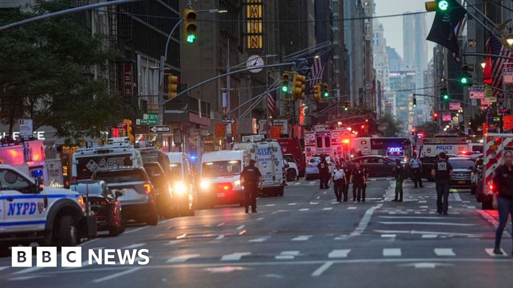 Police officer among four dead in shooting at New York City office building