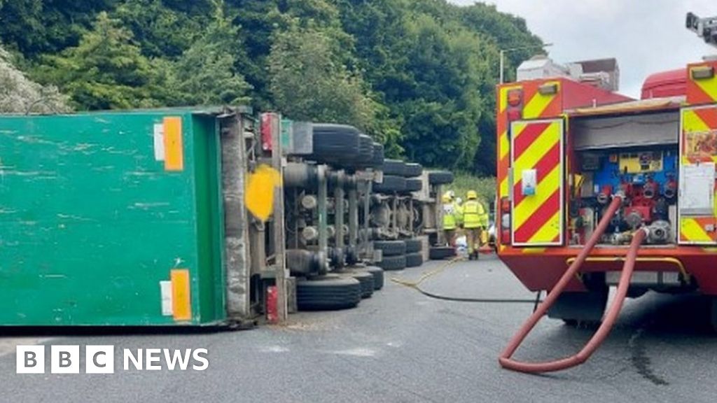 Merley Overturned Lorry On Roundabout Blocks A31 Bbc News