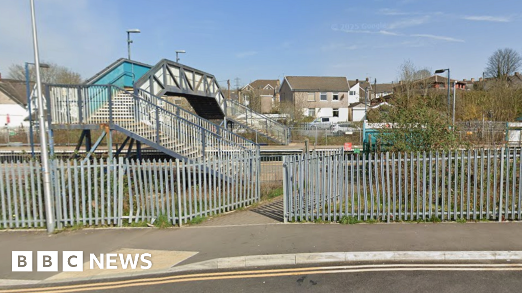 Woman injured after telegraph pole falls on her