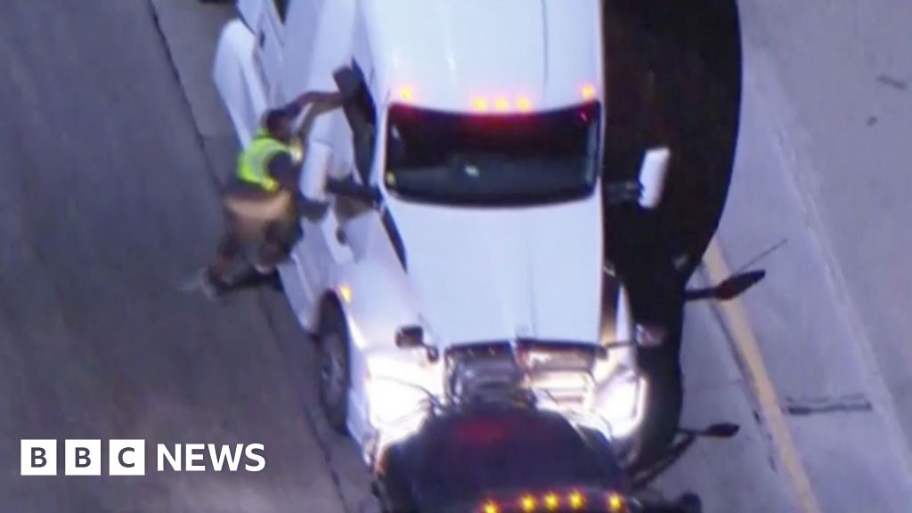 Moment suspects carjack a tanker lorry during police pursuit in LA