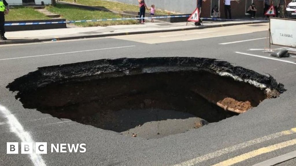 'Absolutely huge' sinkhole appears on Walsall road BBC News
