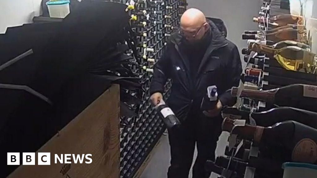 Watch: CCTV shows moment thief stole £24,000 of wine
