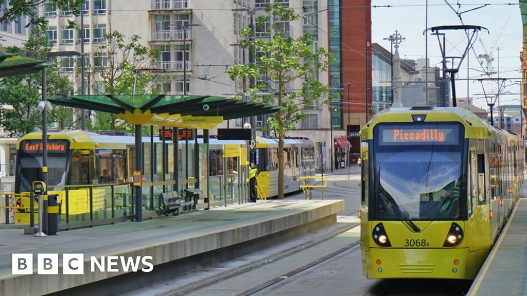 Metrolink trams at St Peter's Square, Manchester