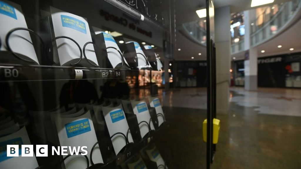 Vending machine selling badges, plays and poems