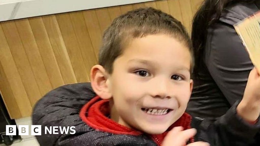 Boy swept away by flood told mother 'Don't panic'