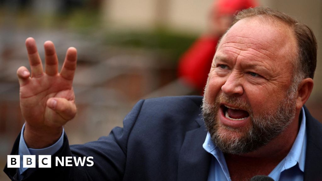 Alex Jones told to pay $965m damages to Sandy Hook victims' families