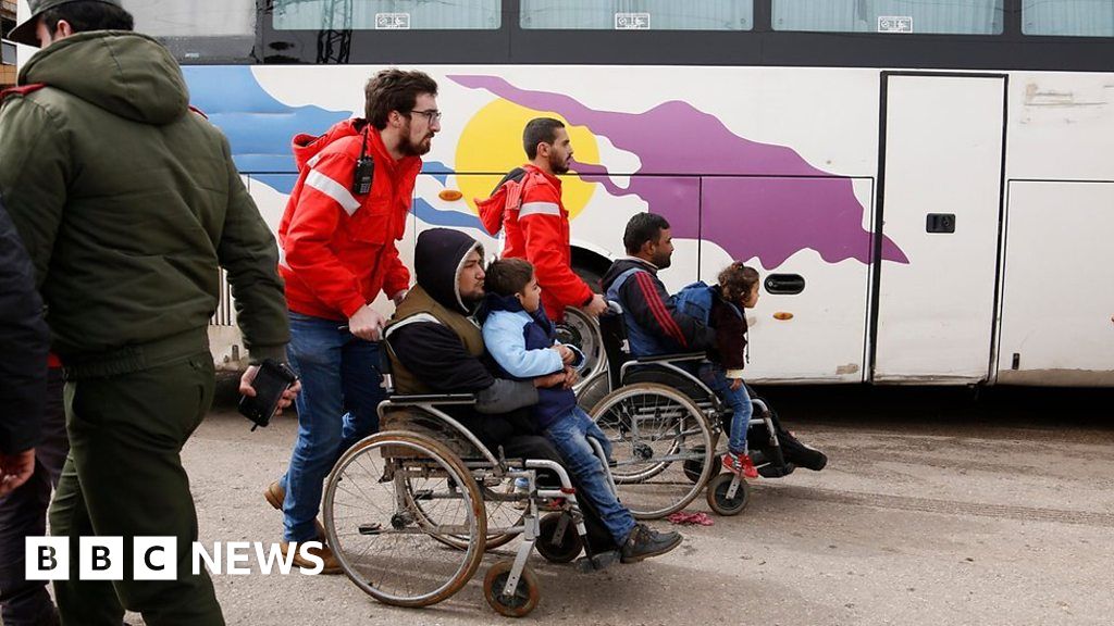 Syrian Rebels And Their Families Leave Homs - BBC News