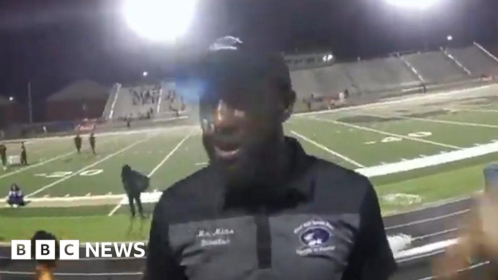Police taser school band director at football game