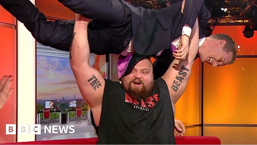 World's strongest man Eddie Hall shows off his strength BBC News