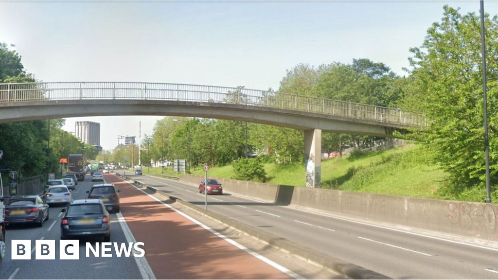 Driver goes to A&E after brick thrown from bridge near M32