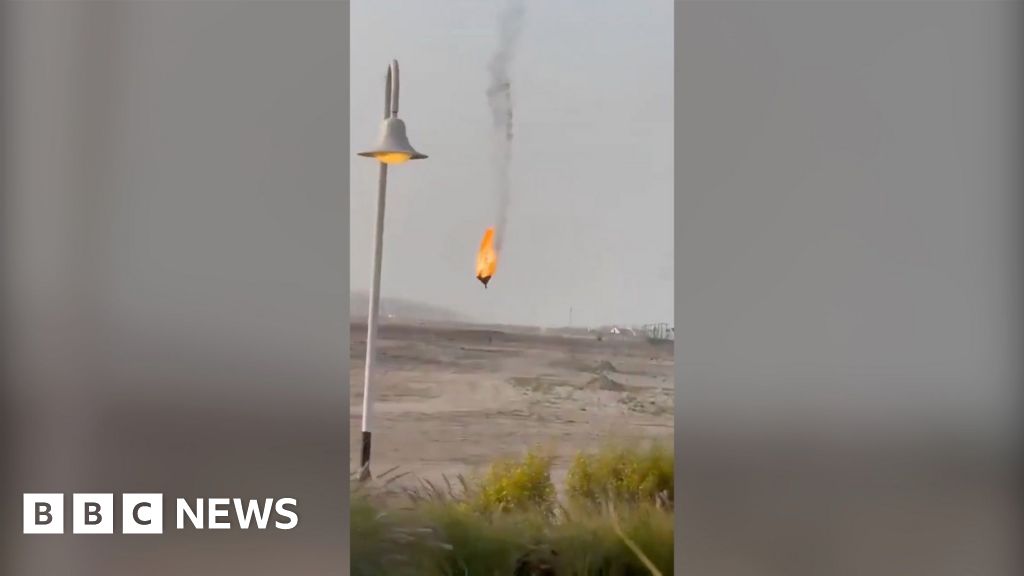 Watch: Footage shows Iranian drone on fire crash-landing in Kuwait