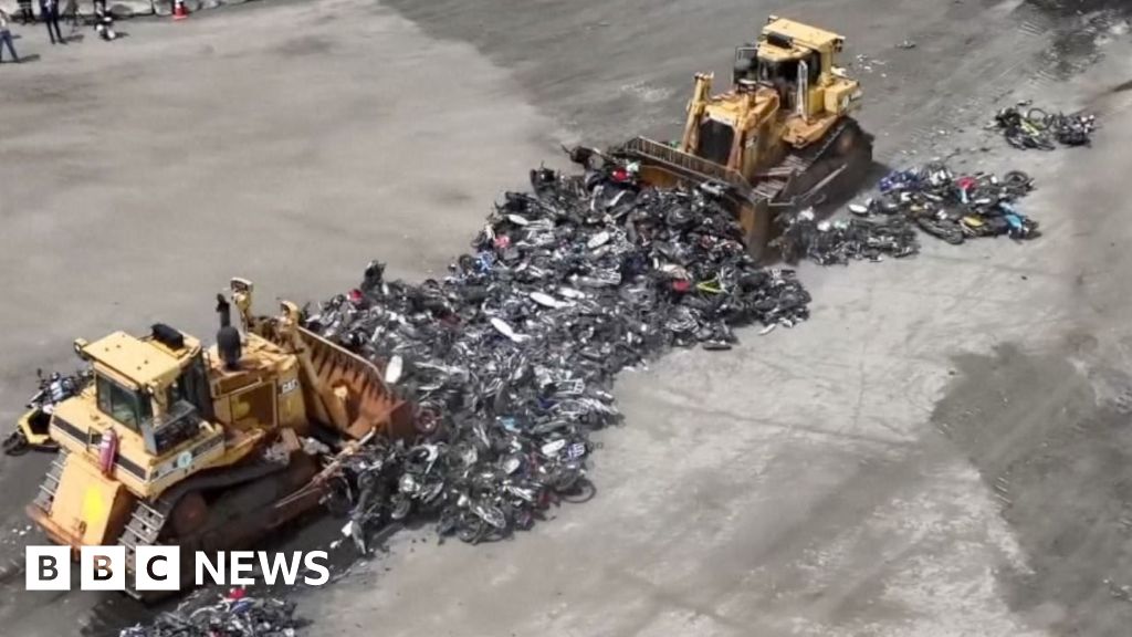 Hundreds of illegal motorbikes bulldozed in New York City crime crackdown