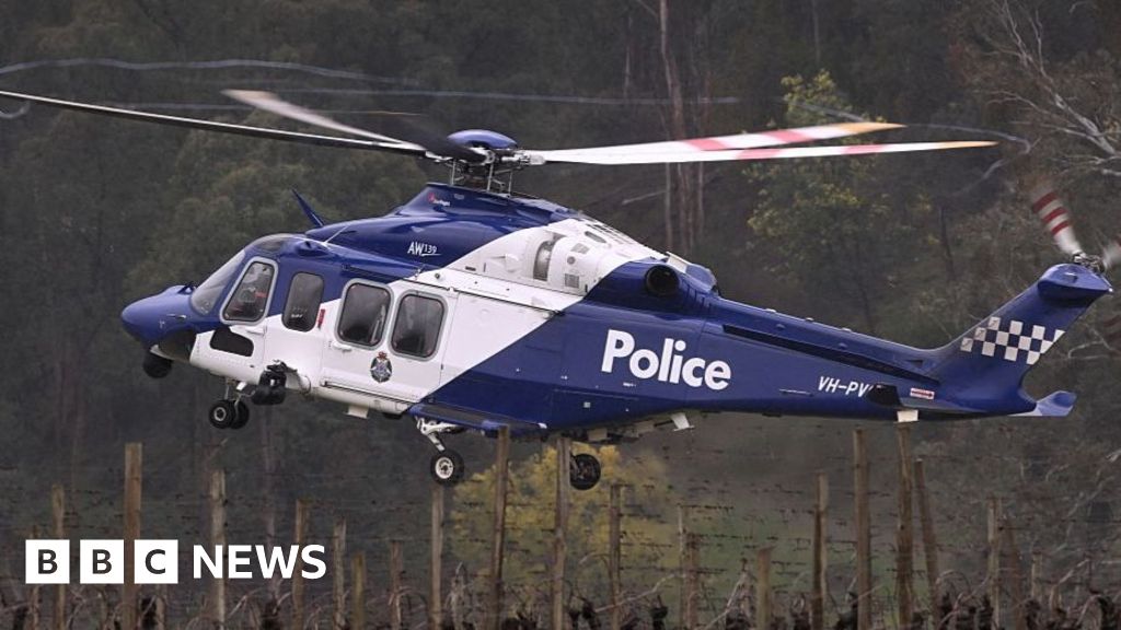 Shock, sadness and relief in town at centre of Australia's seven-month police manhunt