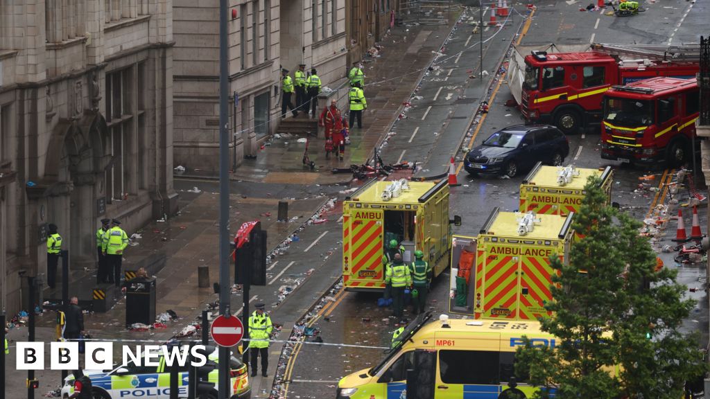 Couple and baby hit by car at Liverpool parade