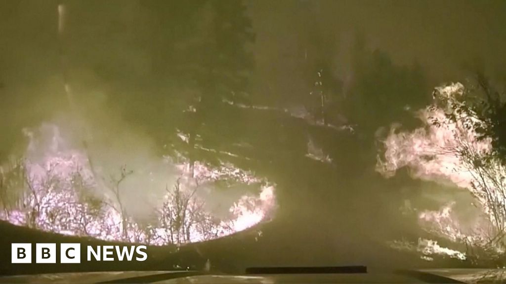 Watch: Police drive through flaming Montana countryside