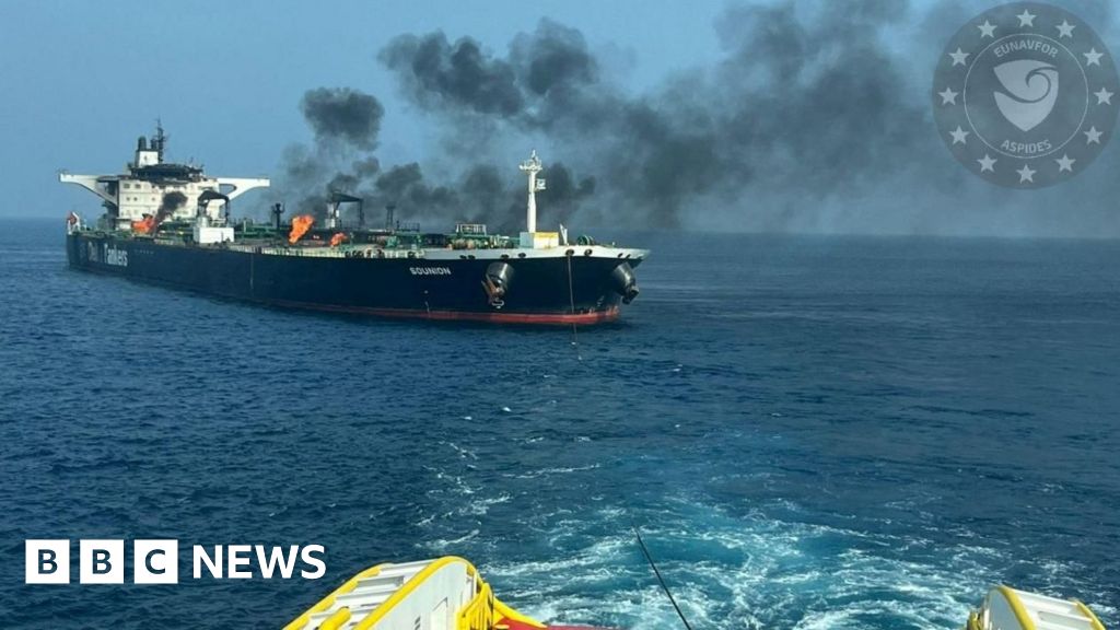 Burning oil tanker towed to protection to avert Crimson Sea spill