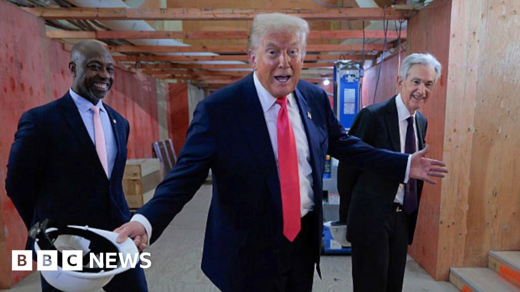 Watch: Trump jokes he wants Powell to lower interest rates in awkward exchange
