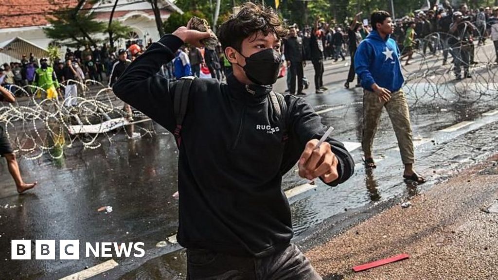 Three dead after protests over death of taxi driver in Indonesia
