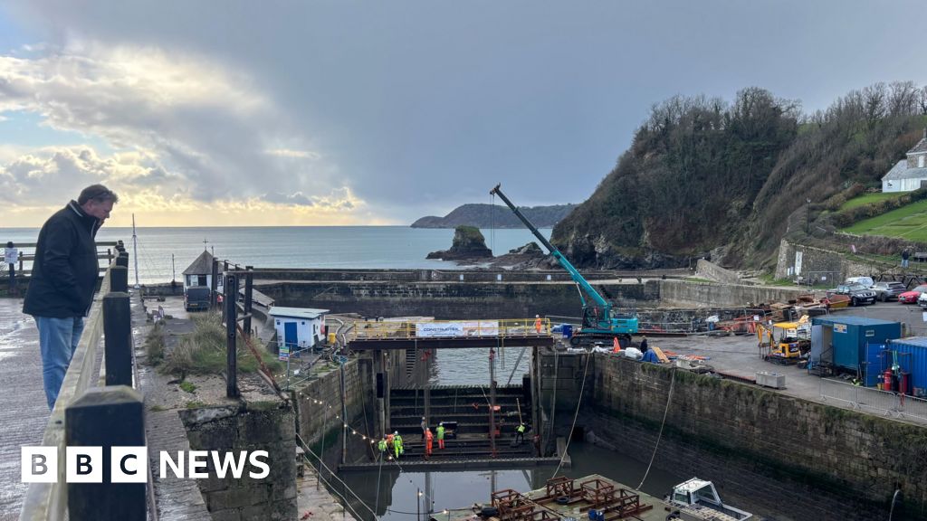bbc.co.uk - Erin Black - New lock gate fitted at Charlestown Harbour following delays - BBC News