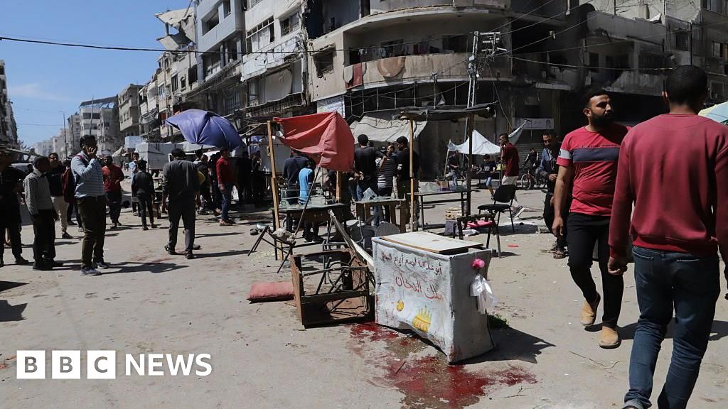 Israeli strikes on Gaza restaurant and market kill 20, medics say