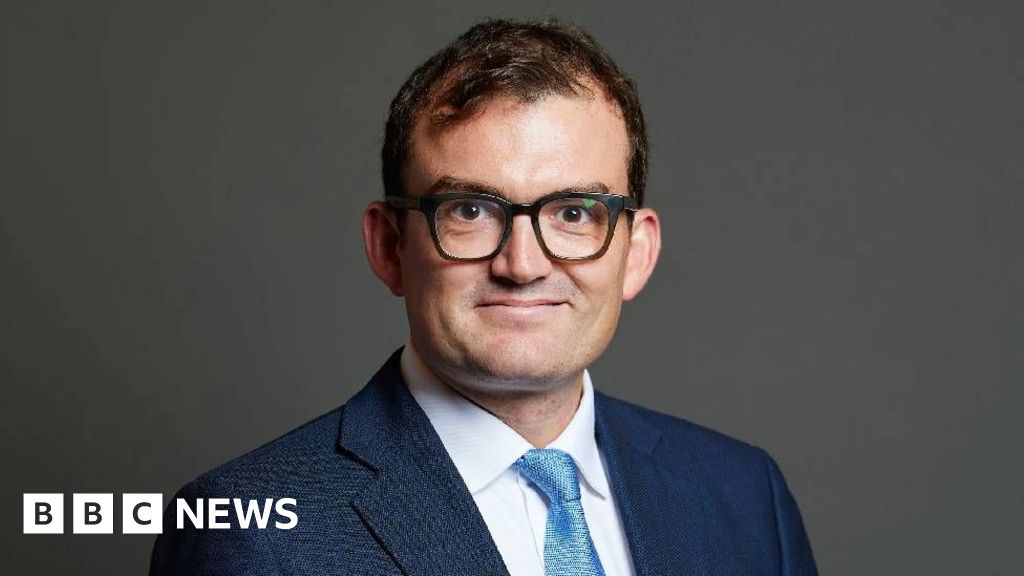 Tory MP charged with two sexual assaults at London's Groucho Club