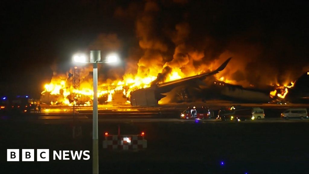 Japan plane fire: Dramatic videos show how plane is overcome by fire at Haneda airport