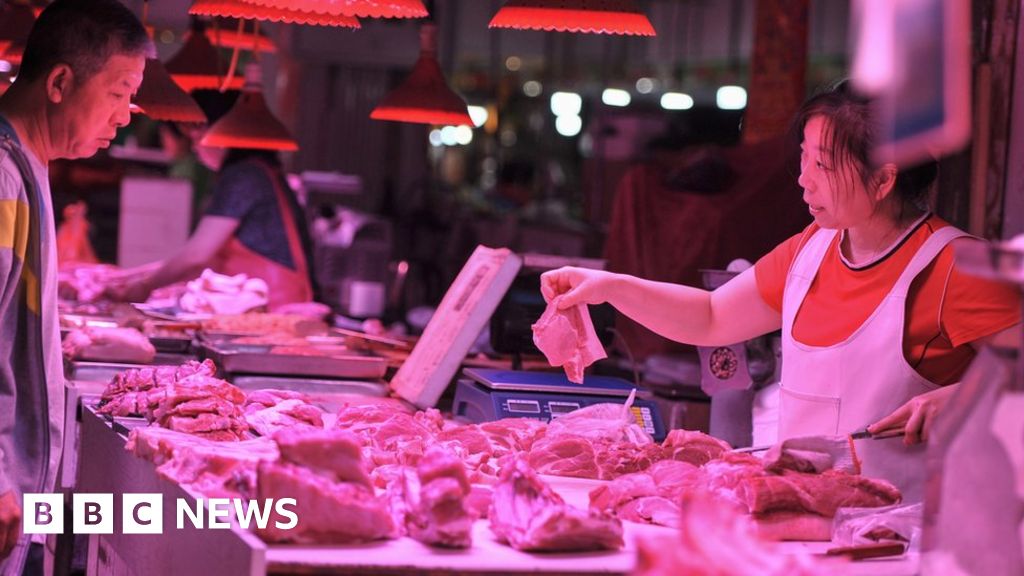 China suspends some Canadian pork imports as tensions rise