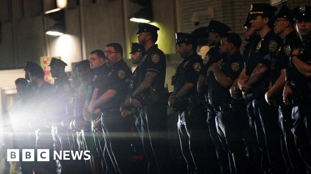 Police officer among four dead in shooting at New York City office building