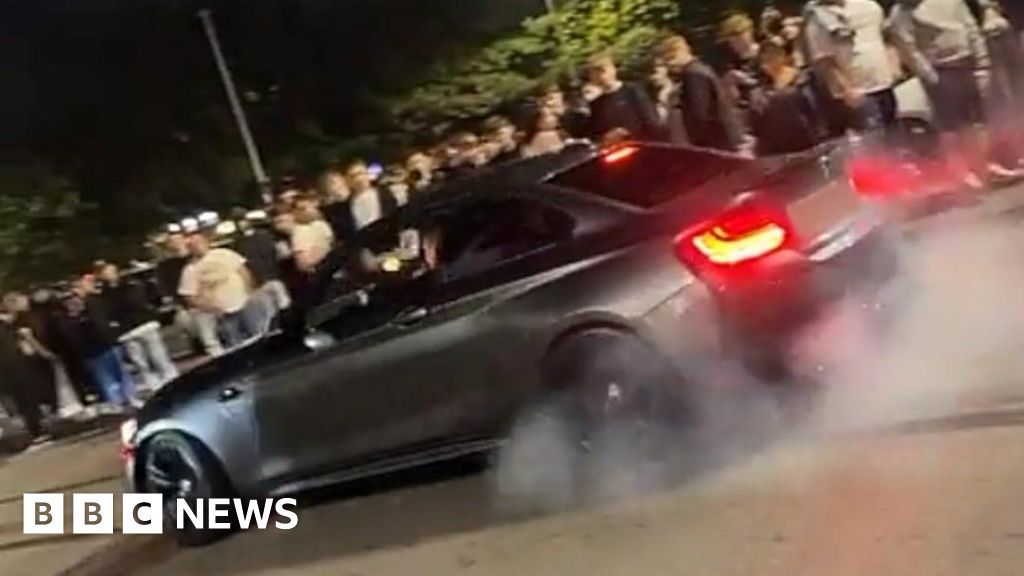 Police confront 'hostile' crowd at fast car meeting