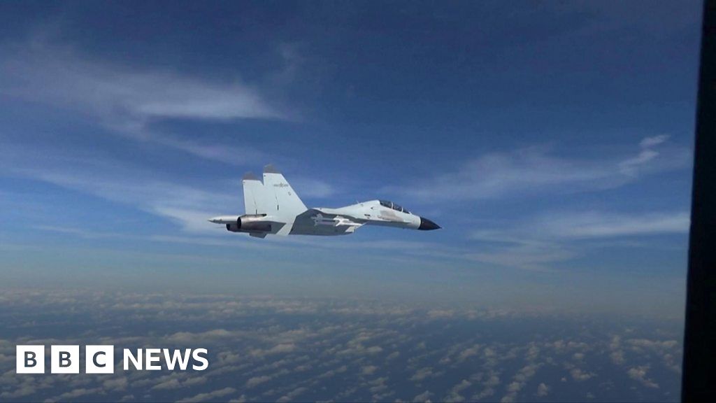 Chinese fighter jet flies 20 feet from US military plane