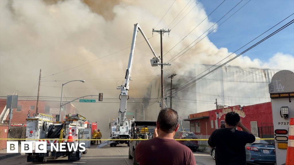Massive Los Angeles warehouse fire continues to burn