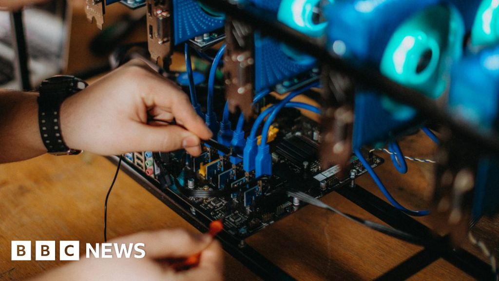 Chinese headmaster fired over coin mining