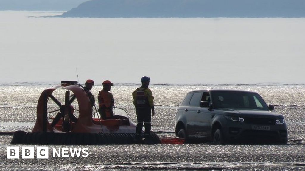 Range Rover Test Driver Rescued By Hovercraft On Mudflats - BBC News