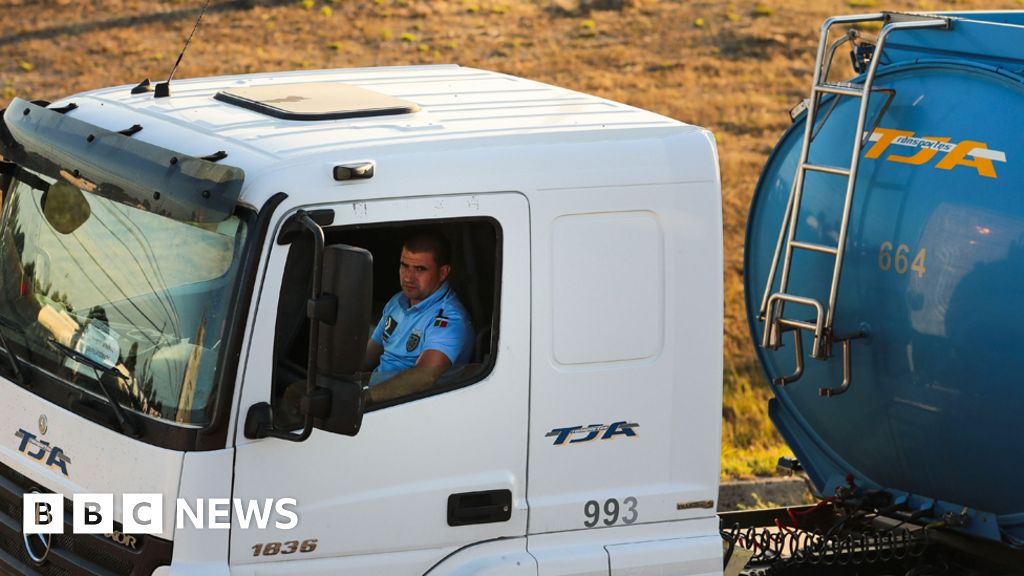 Portuguese police drive fuel trucks as strike bites