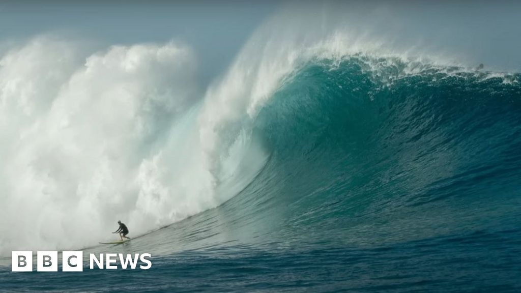 Thirteen-metre wave earns Laura Enever a women's surfing record