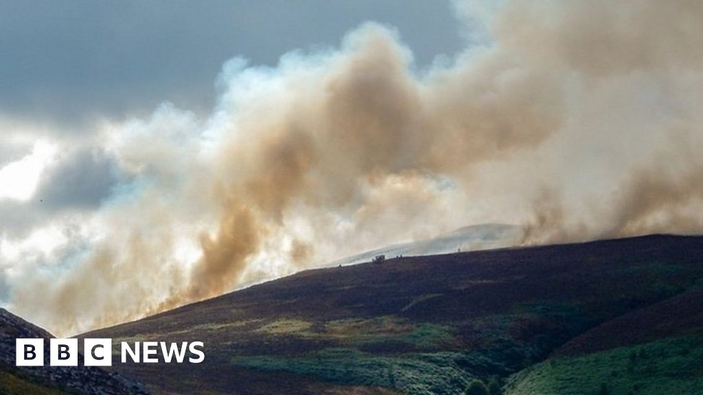 Grass fires still burning across Wales 