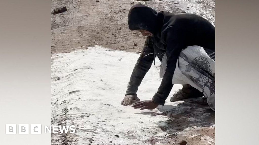 Watch: Man gathers spilled flour off ground as Gaza food crisis grows