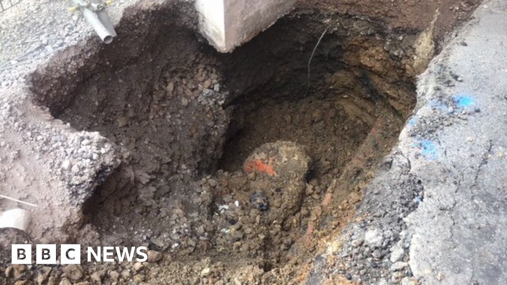 Reading road closed after large hole appears