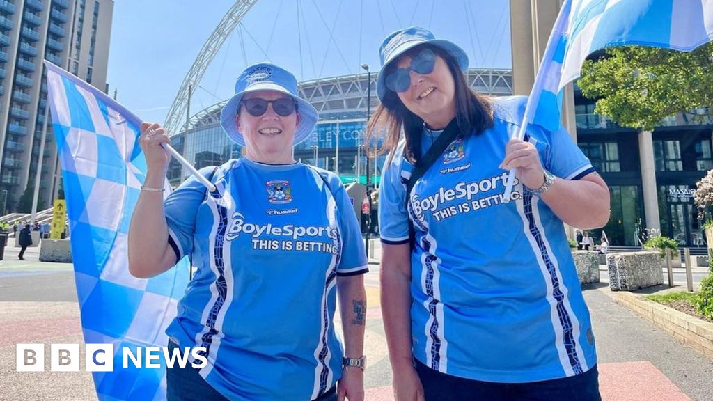 Thousands of Cardiff City fans march against club's blue to red rebrand -  BBC News