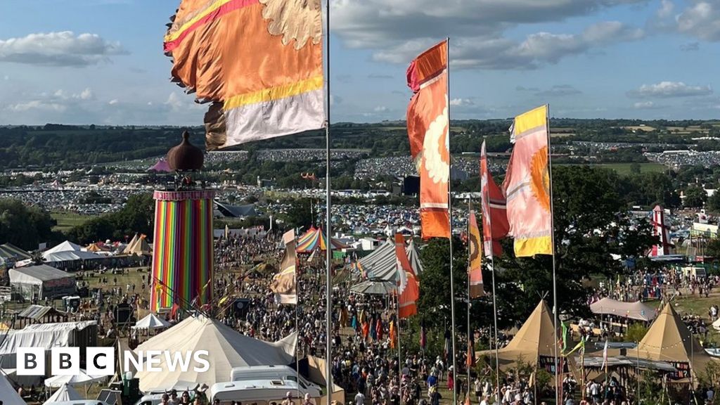 Glastonbury festival crew member dies in tent on site