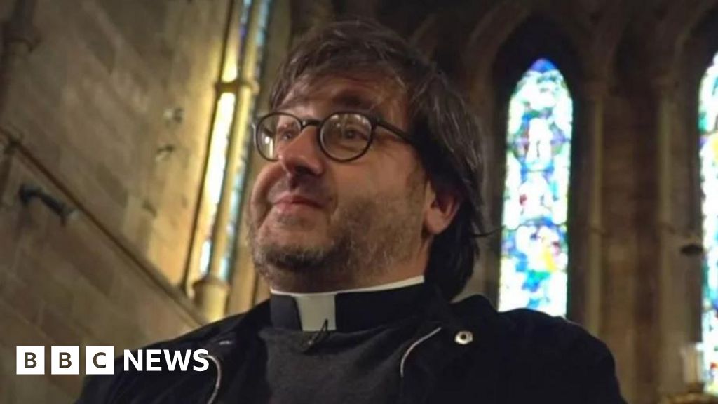 Burnley vicar: 'Stand up to hate' after Muslim grave vandalism - BBC News