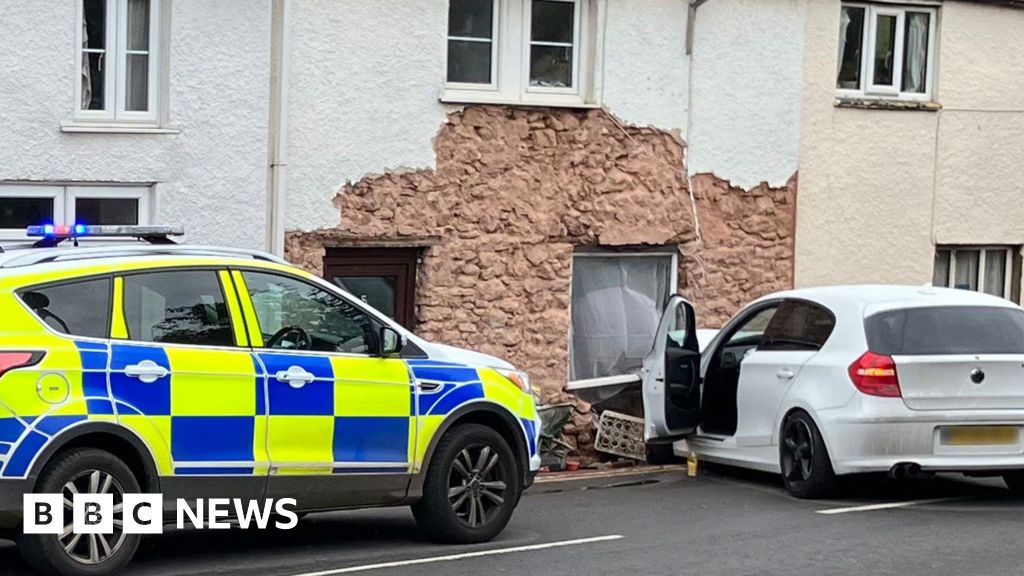 Somerset road partially blocked after car crashed into house