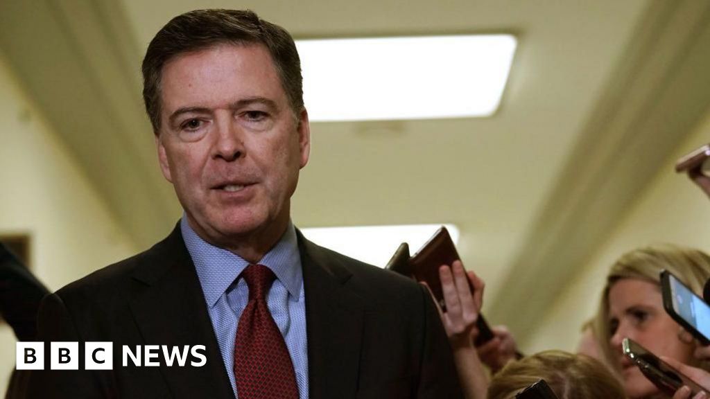 FBI agent suspended over refusal to 'perp walk' former director
