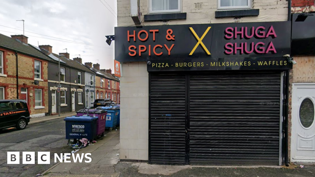 City takeaway boss held over 'illegal entry to US'