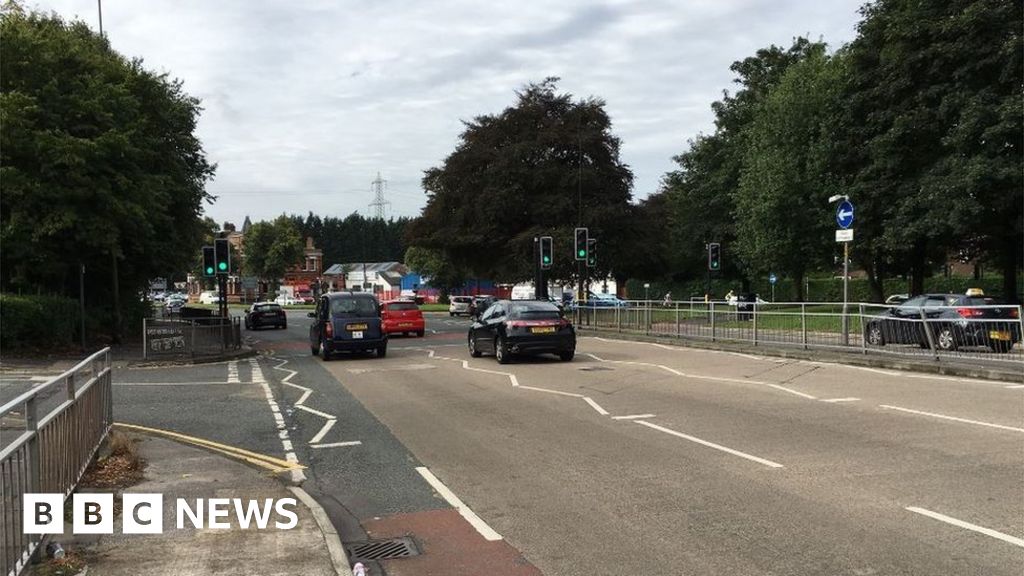 Two arrested over pedestrian's death in Stretford - BBC News