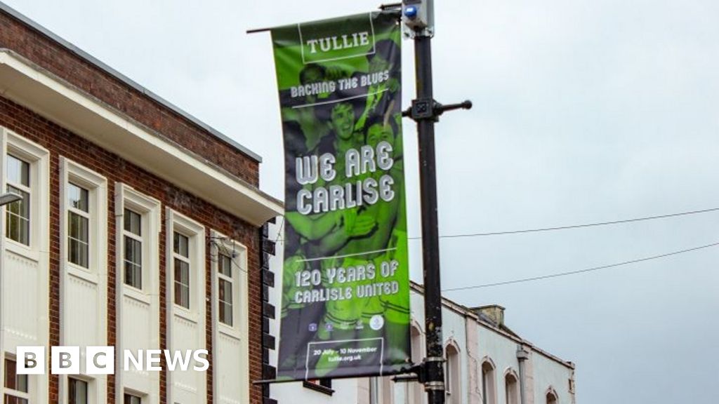 Carlisle decorated with banners which misspell name - BBC News